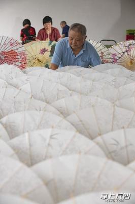 靠一把油纸伞撑起幸福——浏阳贫困户李忠国获全国脱贫攻坚奖奋进奖纪实